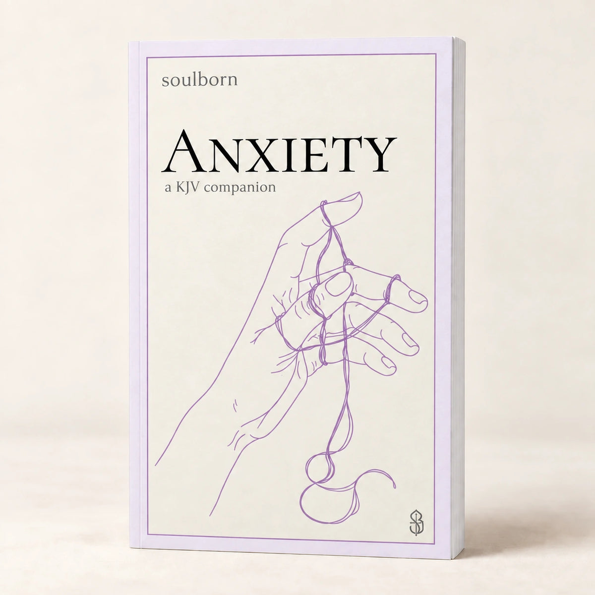 Anxiety — book photograph on a warm cream background